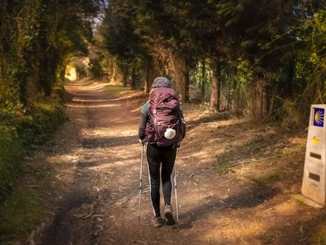 653x490 (2) Nature retreat in a foreign country...group of people on a health retreat - solo woman hiking